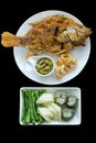 Top view fried tilapia fish and Thai Green Chilli Dip with blanched vegetables, focus selective Royalty Free Stock Photo