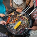 Top view of friend hands serving food, barbecue garden party