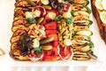 Top view of fruit and vegetable buffet table. Various types of fresh and grilled vegetable and fruit. Celebration