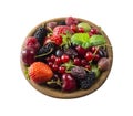 Top view. Fruits and berries in bowl on white background. Ripe currants, raspberries, cherries, strawberries, gooseberries, blackb Royalty Free Stock Photo