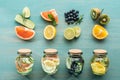 Top view of fruits and blueberries on blue textured surface. Royalty Free Stock Photo