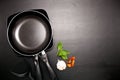Top view frying pan and pot on black table Royalty Free Stock Photo