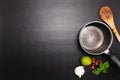 Top view frying pan and pot on black table Royalty Free Stock Photo