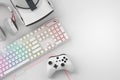 Top view of gamer workspace and gear like mouse, keyboard, joystick, headset, VR Royalty Free Stock Photo