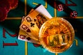 Top view of gaming table in a casino with glasses of whiskey and set of three ladies. Close up of a dark gambling poker Royalty Free Stock Photo