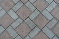 Top view of geometric pavement made of grey and brown tiles Royalty Free Stock Photo