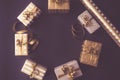 Top view of gift boxes in golden designs. Flat lay, copy space. A concept of Christmas, New Year, birthday celebration