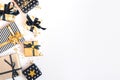 Top view of gift boxes in various black, white and golden designs. Flat lay, copy space. A concept of Christmas, New Year, birthda Royalty Free Stock Photo