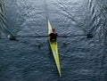 Top view of the girl riding in the canoe