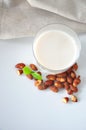 Top view of Glass of Almond Milk on White Background