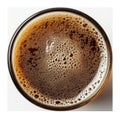 Top view of a glass of fizzy cola with bubbles and froth Royalty Free Stock Photo