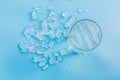 Top view glass of water with ice on blue background, glass of wa