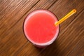 top view of a glass of watermelon juice with a straw Royalty Free Stock Photo