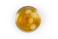 Top view of glass of whisky with ice on white background Royalty Free Stock Photo