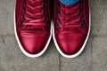 Top view of glossy sneakers,red color of year 2023