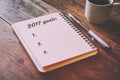 Top view 2017 goals list with notebook