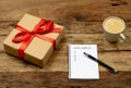 2019 Goals on notebook with pen Gift box and coffee on wood table for New Year Resolution concept Royalty Free Stock Photo