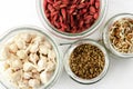 Top view of goji berries and sprouts in glass jars Royalty Free Stock Photo