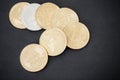 Top view on gold cryptocurrency coins on black background Royalty Free Stock Photo
