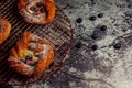 Top view of golden chese danish pasties with blackberries and powder sugar Royalty Free Stock Photo