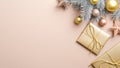 Top view Golden Christmas gifts and decorations on paste ivory background with copy space. Flat lay Xmas tree silver branch, Royalty Free Stock Photo