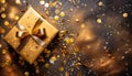 top view of a golden wrapped present with a beautiful bow on a rustic old table with lots of confetti