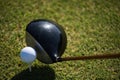 Top view of golf club and ball in grass Royalty Free Stock Photo