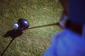 Top view of golf club and ball in grass Royalty Free Stock Photo