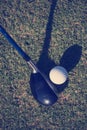 Top view of golf club and ball in grass Royalty Free Stock Photo