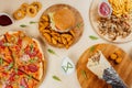 Top view of a gourmet restaurant table with delicious fast foods