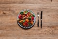 top view of gourmet salad with mussels, vegetables and jamon on wooden table Royalty Free Stock Photo
