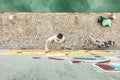 Top View Of Graffiti Artist Painting With Color Spray On The Wall - Urban, Street Art, Millennials Generation, Mural Concept -