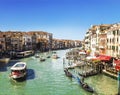 Top view of the Grand Canal, floating gondolas and ships with tourists, Venice