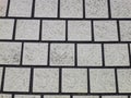 Top view granite outdoor floor tiles. Selective focus.