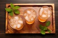 top view of grapefruit iced tea served on a wooden tray