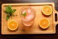 top view of grapefruit iced tea served on a wooden tray