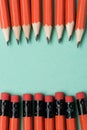 top view of graphite pencils and erasers on pencils placed in rows Royalty Free Stock Photo