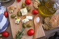 Top view Greek cheese feta with virgin olive oil, green olives a