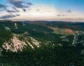 Top view of the green forests, mountains and village. Crimea