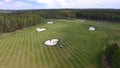 Top view green golf course outdoor green grass field. Aerial view from flying drone Royalty Free Stock Photo