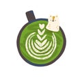 Top view of green matcha coffee cup with cute cat in it. Vegetarian organic drink with foam. Vegan herbal cappuccino or