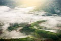 Top view of green mountains with clouds in rainy Royalty Free Stock Photo