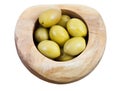 Top view of green olives in wooden bowl isolated Royalty Free Stock Photo