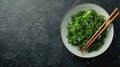 green seaweed and sesame seeds salad with chopsticks. Superfood. Japanese traditional food. Banner with space for text Royalty Free Stock Photo