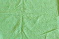 Top view of Green Towel texture. Green Towel Fabric Texture Background. Close-up. Green natural cotton towel background. Royalty Free Stock Photo