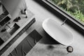 Top view of grey bathroom interior with sink and bathtub near panoramic window Royalty Free Stock Photo