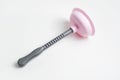 Top view of grey pink plunger on white background. Royalty Free Stock Photo