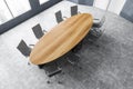 Top view of grey and wooden conference room with modern furniture