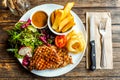 Top view Grilled pork steak with vegetables salad and french fries Royalty Free Stock Photo