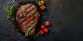 top view grilled steak with pepper herbs and tomatoes on stone black surface, flat lay with copy space, roast beef Royalty Free Stock Photo